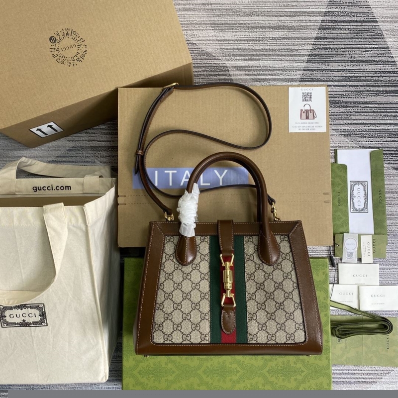 G*u*i top handle bags